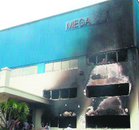 A factory building damaged by fire in Binh Duong province on Wednesday