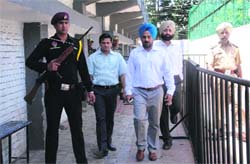 DC Tejinder Pal Singh Sidhu reviews the preparedness at the counting centre at Phase VI in Mohali. Tribune photo: Vicky Gharu