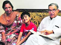 Congress candidate Pawan Bansal with his wife and grandson at his residence in Sector 28, Chandigarh, on Thursday; and (below) BSP candidate Jannat Jahan with her daughters Amairah and Ruhaani at her residence in Sector 35. Tribune photos: Parvesh Chauhan