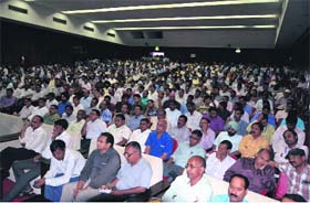 Officials being given training for the counting of votes at the ONGC hall in Dehradun on Thursday