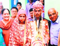 Yogi Seth, a businessman from Pathankot, (extreme right) shoulders the financial responsibility of solemnising marriages of girls from poor families.