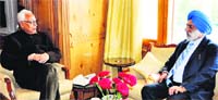 Governor NN Vohra interacts with Prof MPS Ishar, Vice Chancellor, Jammu University, at Raj Bhawan in Srinagar on Thursday. A Tribune photograph 