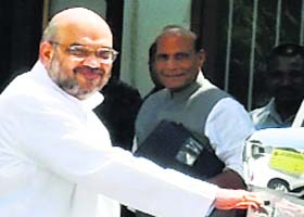 BJP leader Amit Shah with party president Rajnath Singh in New Delhi on Thursday