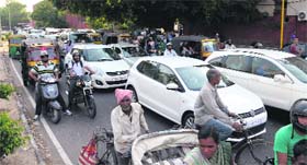 Vehicles stranded at the Sector 27/19 light point in Chandigarh after the BJP took out a rally to celebrate its victory in the Lok Sabha elections on Friday.