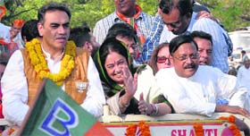 Kirron Kher, along with Sanjay Tandon and Satyapal Jain, during a victory rally in Chandigarh on Friday.