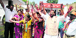 Activists celebrate the BJPs victory in the Lok Sabha elections at the party office in Dehradun on Friday