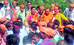 Victorius BJP candidate Ajay Tamta from the Almora (reserve) seat takes out a victory procession on Friday
