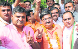BJP candidate Ashwini Chopra and party leaders after victory in Karnal on Friday. Tribune photo: Ravi Kumar