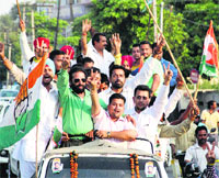 Congress workers in a jubilant mood after the win of Congress candidate Chaudhary Santokh Singh in Jalandhar on Friday. photo: Sarabjit Singh