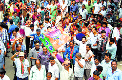 BJP supporters celebrate the partys victory in Dibrugarh, Assam, on Friday