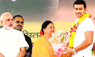 Rajyavardhan Singh Rathore, seen here with Narendra Modi and Vasundhara Raje, defeated political heavyweight CP Joshi, the former Rajasthan Cricket Association president, by over three lakh votes for an impressive political debut.