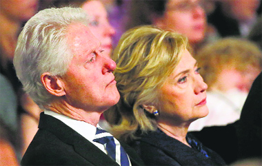 Former US President Bill Clinton with his wife Hillary Clinton during the dedication ceremony at the National September 11 Memorial Museum in New York. The museum, commemorating the September 11, 2001, attacks on New York and Washington opens to the public on May 21