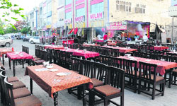 A view of the Improvement Trust land being encroached upon by Hotel Sweet Milan. Tribune Photo: Pawan Sharma