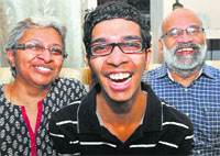 Siddhartha flanked by his parents at their residence in Sector 24, Chandigarh, on Saturday. Tribune photos:Parvesh Chauhan