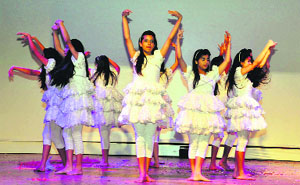 Girls perform at St Josephs Academy in Dehradun on Saturday.