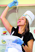 Actor Neha Dhupia during a pasta party on the eve of the World 10K Marathon in Bangalore on Saturday