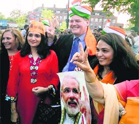 Indians celebrate BJPs victory in London on Friday