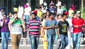 Students come out of an examination centre in Chandigarh on Sunday