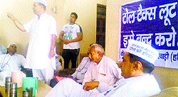 Dr Ashok Dixit addresses a meeting of toll samitis in Rewari on Sunday
