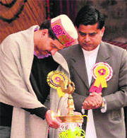 Kullu DC Rakesh Kanwar lights the lamp at the annual function of the OLS School in Kullu on Saturday.