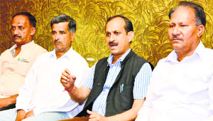 BJP state president and Una MLA Satpal Singh Satti addresses mediapersons in Una on Sunday.
