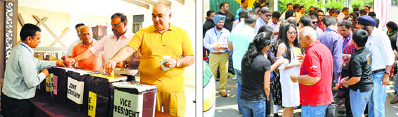 Members cast vote during elections at the Sutlej Club in Ludhiana on Sunday; and (right) a gathering outside the club.