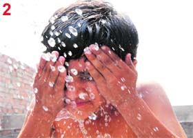 A child takes a shower