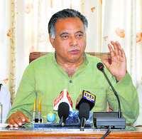 Transport Minister GS Bali addresses a press conference at Dharamsala on Monday