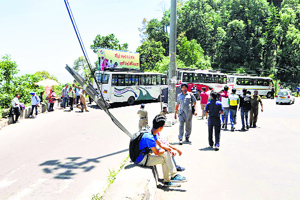 Passengers at the bypass road in Shimla on Monday.