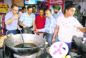 Health officials check the canteen of Dayanand Model School in Jalandhar on Monday
