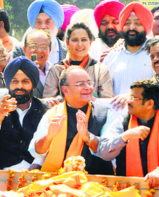 (R-L, front row) BJP state chief Kamal Sharma, Arun Jaitley and Bikram Majithia at a rally in Amritsar.