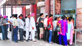 A long queue outside the window of the Birth and Death Certificate Department in Amritsar on Tuesday.
