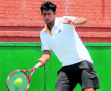 Ranjeet plays a shot during the CLTAAITA mens tennis tournament at Sector 10 in Chandigarh on Tuesday