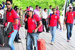 Players of Kings XI Punjab at JW Marriott in Sector 35, Chandigarh; Kings XI Punjab owner Preity Zinta prays for the teams victory