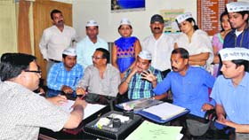 AAP workers protest at the Irrigation Department Office in Dehradun on Tuesday.