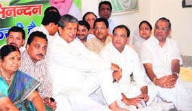 Chief Minister Harish Rawat and state Congress unit chief Yashpal Arya during the Uttarakhand Congress State Working Committee meeting at Congress Bhavan in Dehradun on Tuesday.