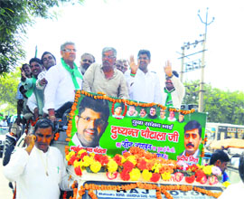 Newly-elected INLD MP from Hisar Dushyant Singh Chautala (second from right) during a roadshow in Jind on Tuesday.