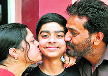 Family members of Abhimanyu Kalsotra celebrate his success in the Class X Jammu and Kashmir State Board of School Education examination