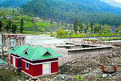 Hotels being constructed on the banks of the Lidder in Pahalgam