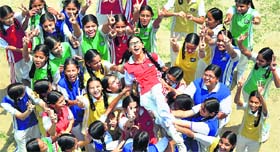 Students in a jubilant mood after the declaration of CBSE Class X results in Patiala on Tuesday.