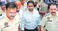 Local Bodies Minister Anil Joshi outside the Amritsar courts complex on Tuesday. tribune photo: Vishal Kumar
