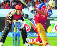 Yuvraj hits a six during the match between Bangalore and Hyderabad on Tuesday. PTI