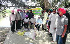 Teams that collected water and soil samples at Joganand village in Bathinda on Wednesday.