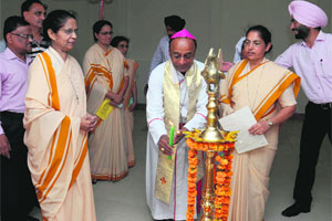 Bishop of Shimla-Chandigarh Diocese, Dr Ignatius L Mascarenhas along with principal Helen Dcosta lights a lamp at the inaugural function of the new block of St Josephs Convent School in Bathinda on Wednesday.