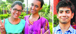 Kishika (left) and Navya Singhal, joint second toppers in the tricity in the ICSE Class X examinations, show the victory sign; and (right) Shubham Mawa, who bagged the joint third slot, at Little Flower Convent School in Panchkula on Wednesday. Tribune Photo
