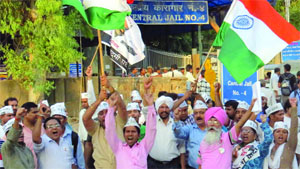 AAP supporters protest against Arvind Kejriwals arrest outside Tihar Jail in New Delhi on Wednesday.