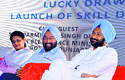 Finance Minister Parminder Singh Dhindsa (right) with Vikramjit Singh Sahney (centre), chairman, Sun Foundation, at Guru Nanak Bhawan in Ludhiana on Wednesday