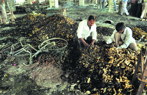 Vendors at the gutted vegetable market in Patiala on Wednesday.