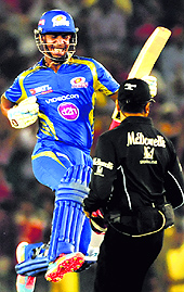 Simmons celebrates on reaching a hundred against Kings XI in Mohali on Wednesday