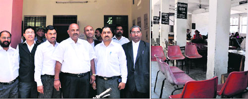 Advocates protest outside the CJM court in Dehradun; and cabins of advocates give a desolate look in Dehradun on Thursday.